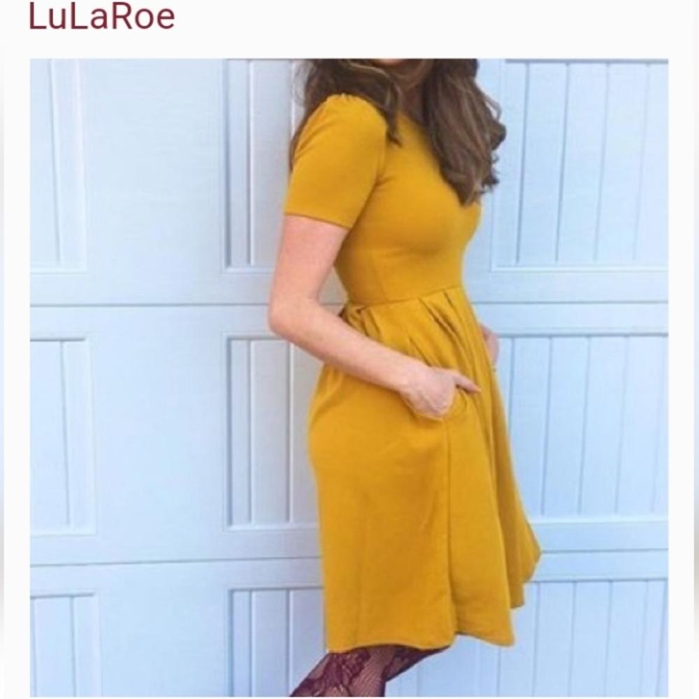 💰3/$30NWT LulaRoe Pleated yellow dress